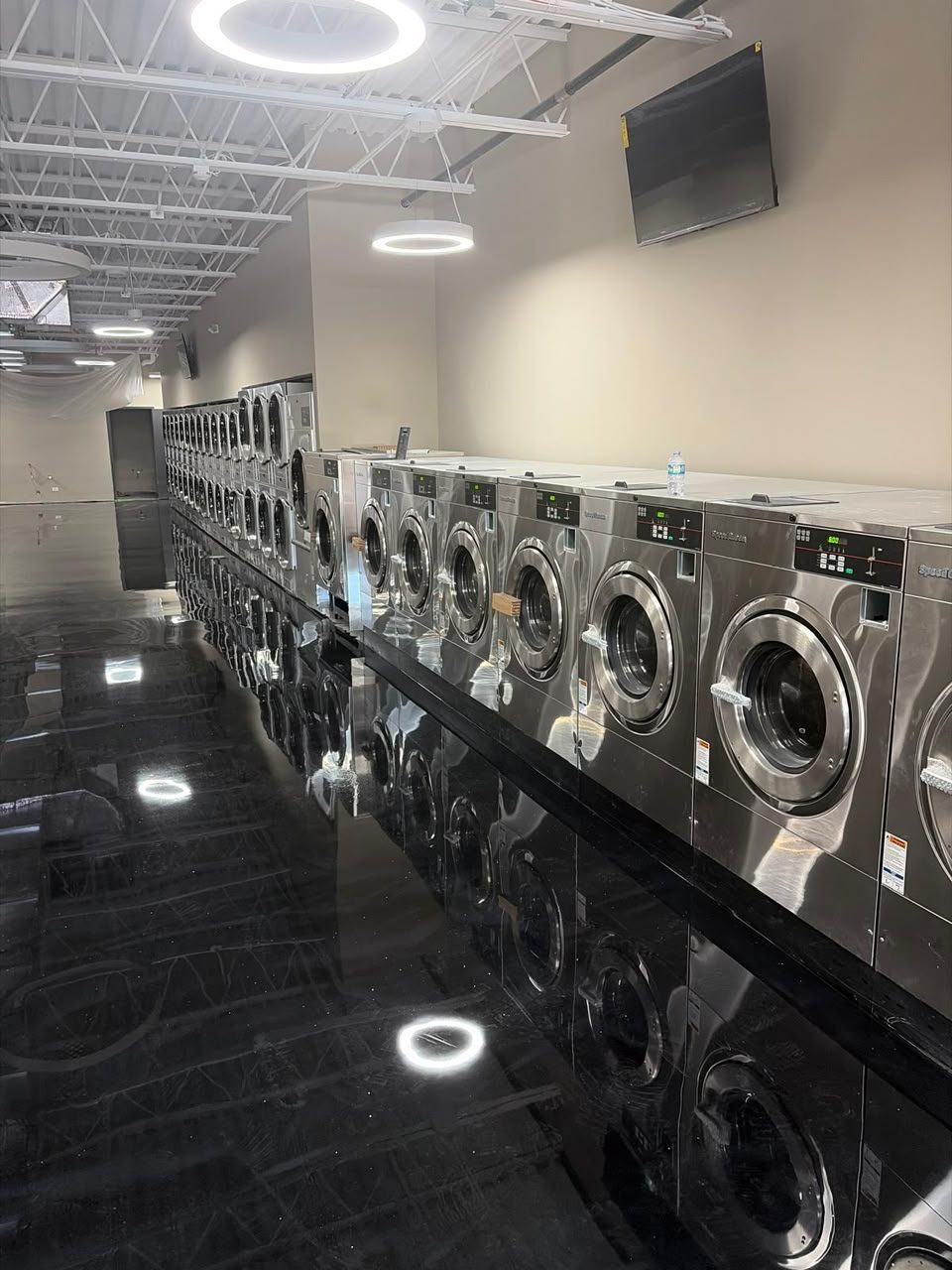 Row of washers at Tamarac Laundromart